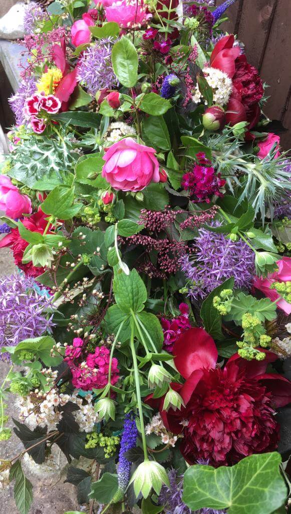 Bright pink and purple table centrepiece